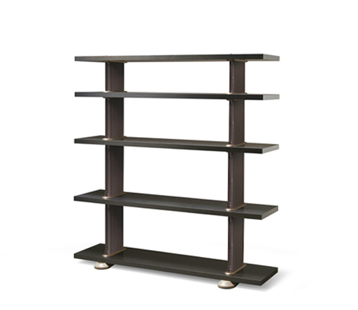 Peggy is a modular wooden bookcase with  leather covered supports and bronze details, from Promemoria's catalogue | Promemoria