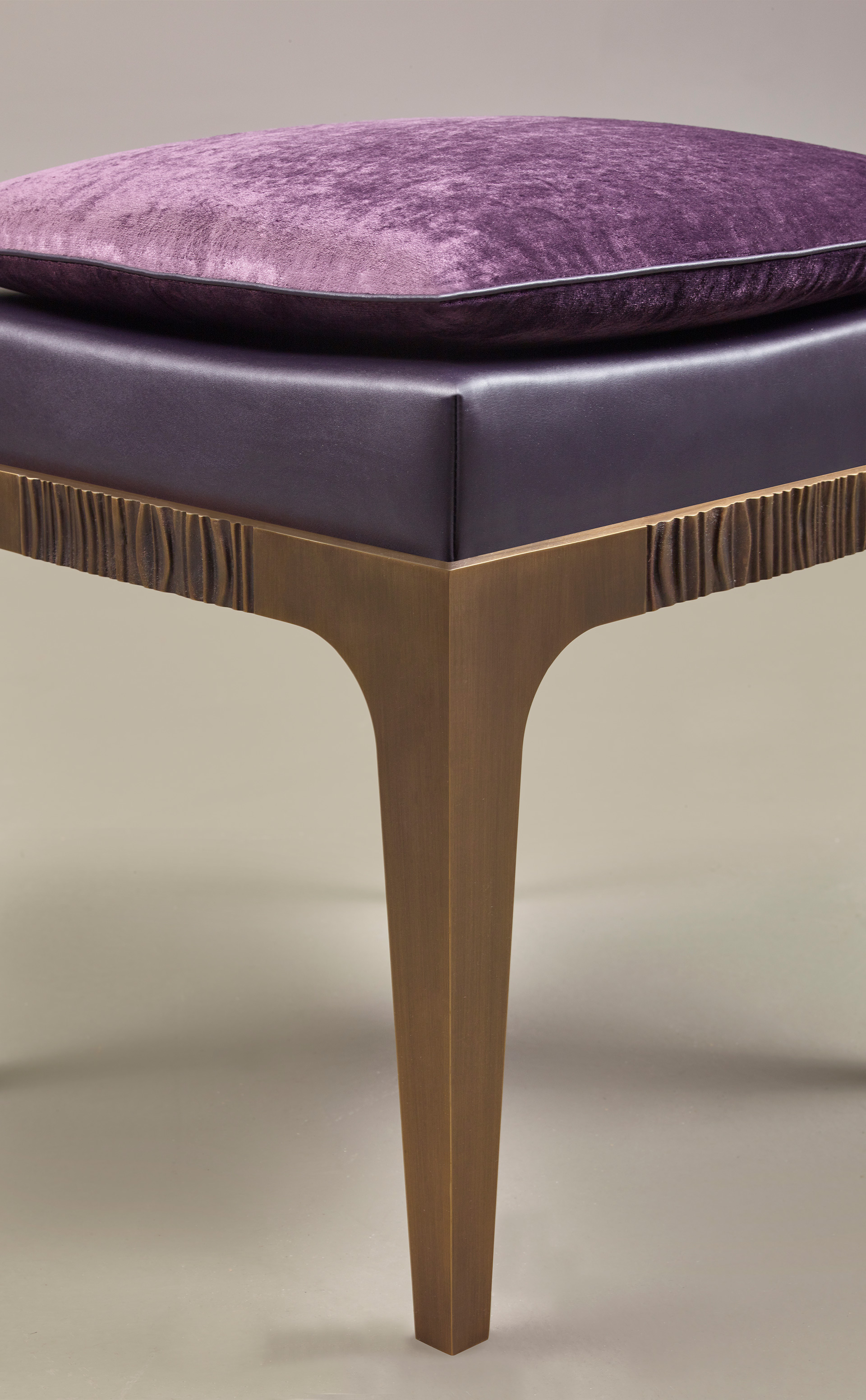 Detail of Montagu, a bronze stool with leather seat and fabric cushion, from Promemoria's The London Collection | Promemoria