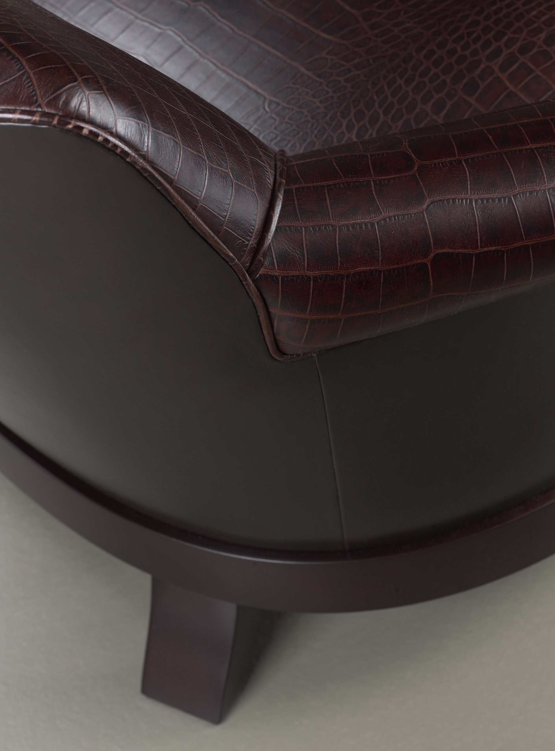 Detail of Gacy, a wooden armchair covered in fabric or leather, from Promemoria's catalogue | Promemoria