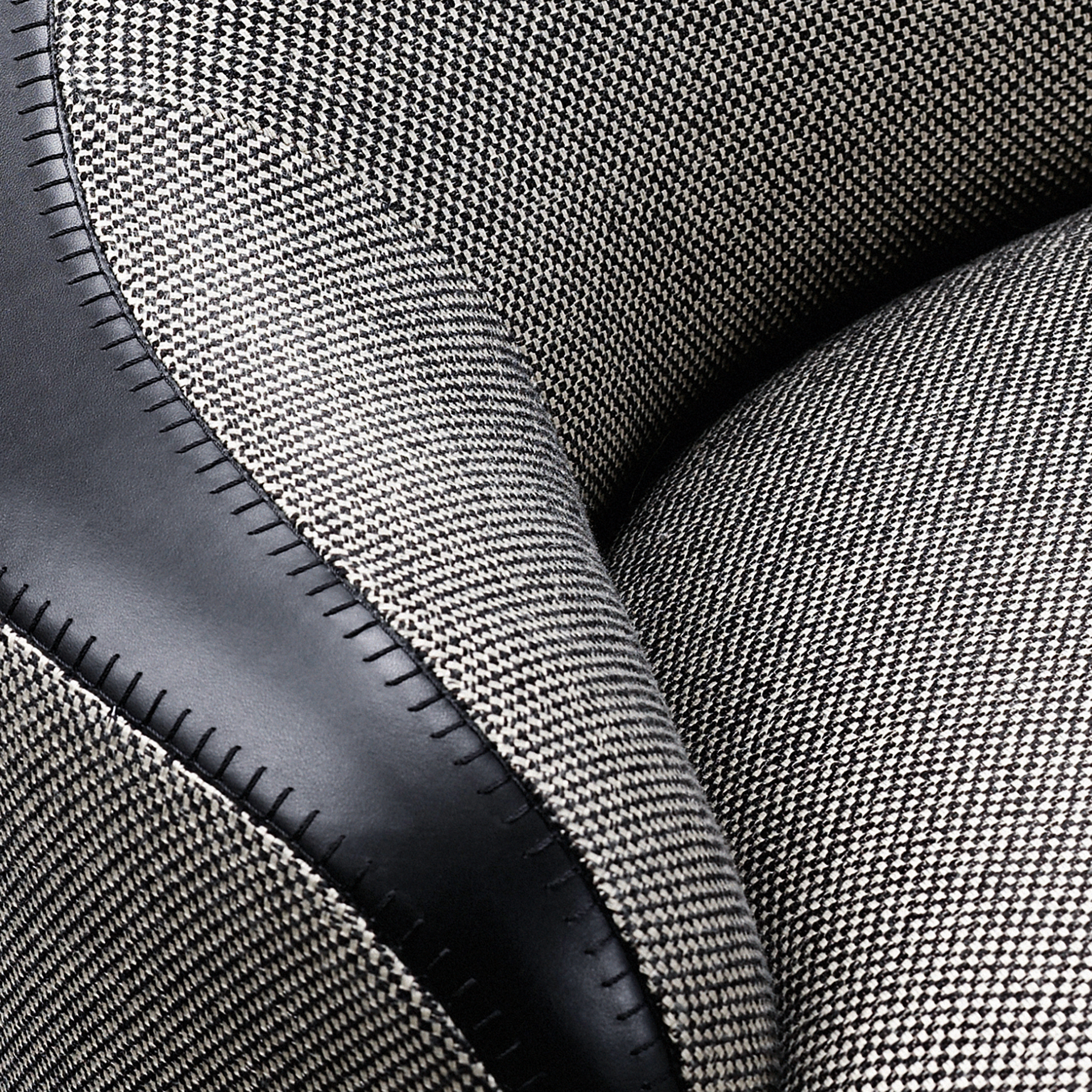 Gioconda and Giocondina are two fabric armchairs available with leather details, from Promemoria's catalogue | Promemoria