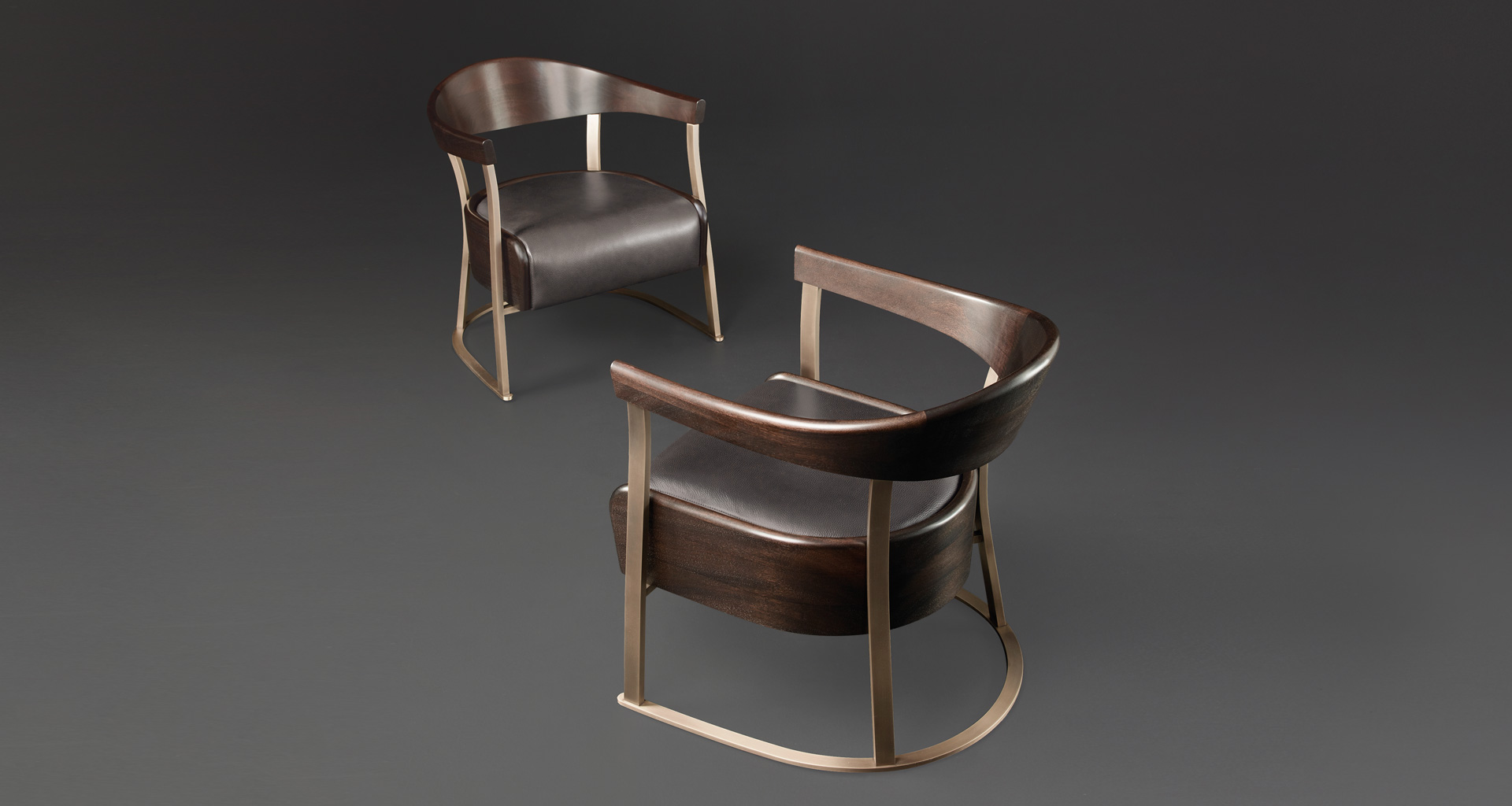 Rachele is a bronze armchair covered in leather, from Promemoria's catalogue | Promemoria