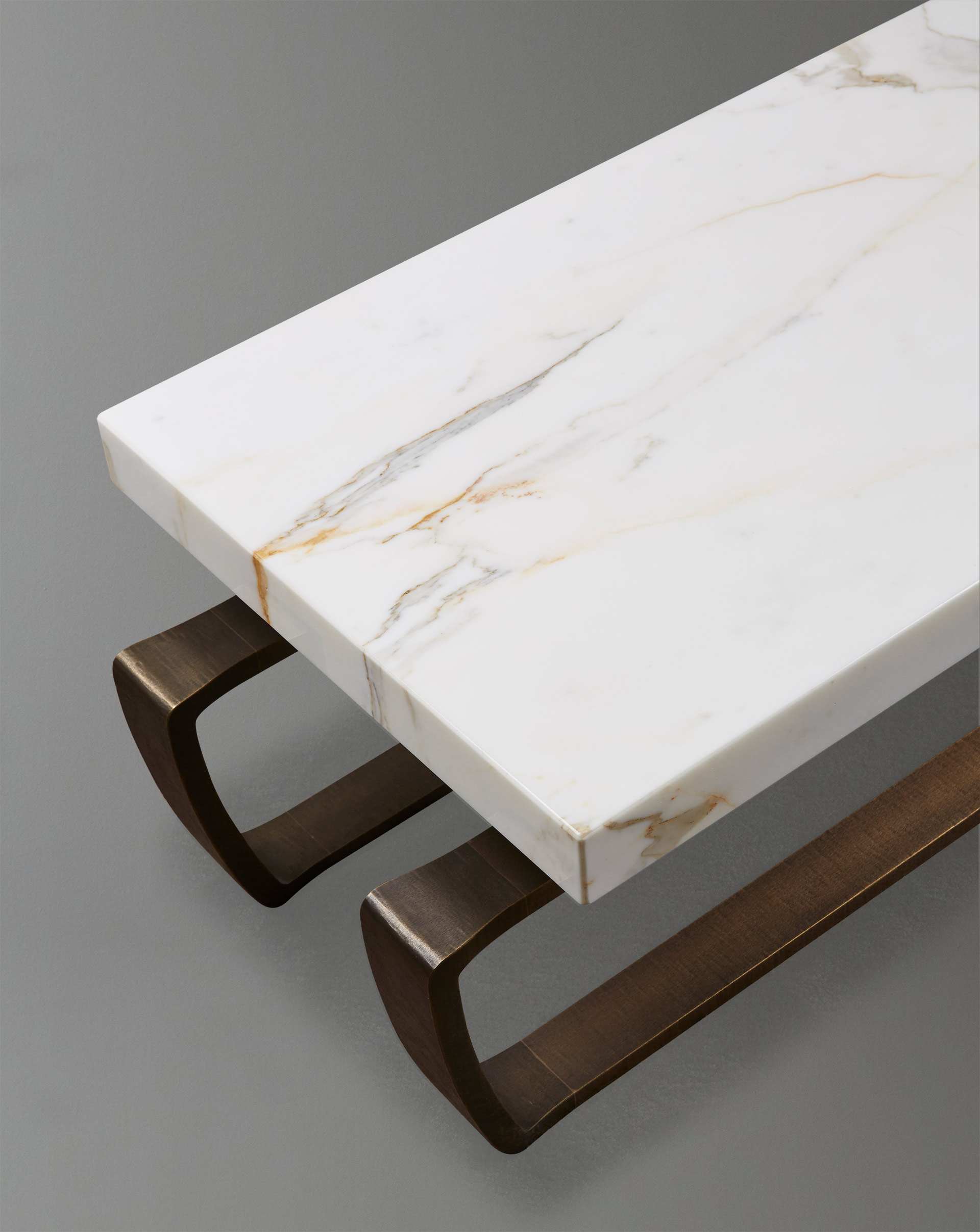 Marble top detail of Saint Moritz, a coffee table with a bronze base, from Promemoria's catalogue | Promemoria